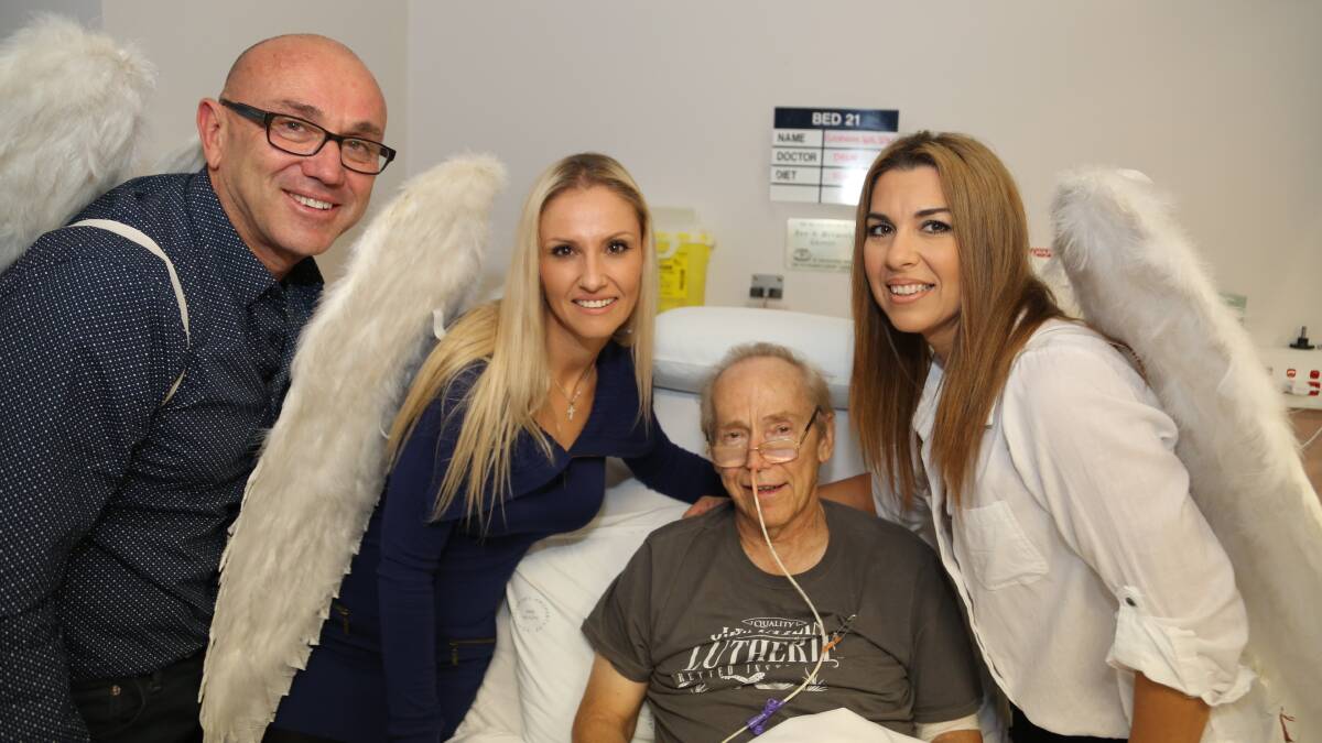 Lube Markovski, Dragana Uzelac and Angela Juskiw visiting Graham Wilson for Angels at Work. Picture by Greg Ellis.