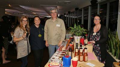 Caption - Jonni Nicolaou with Marie Smith, of Early Years Care, and Portors Produce stallsholders Craig Roy and Trish Roy at the Lagoon Seafood Restaurant night markets. Picture by Greg Ellis.
