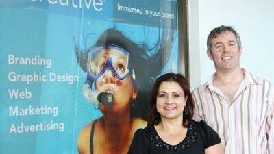 Michelle Morrissey and Dan O'Regan at the 121 Creative design studio at Kwik Kopy in Keira St, Wollongong. Picture by Greg Ellis.

