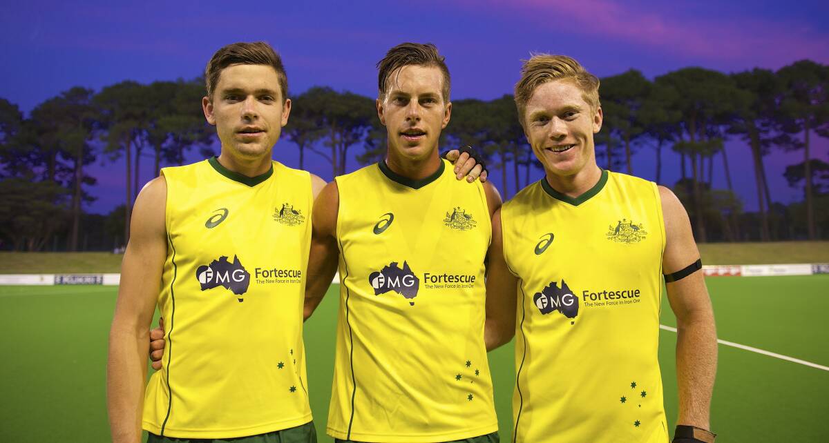 Flynn Ogilvie (left) with fellow young Kookaburras players Dylan Wotherspoon and Matt Dawson.