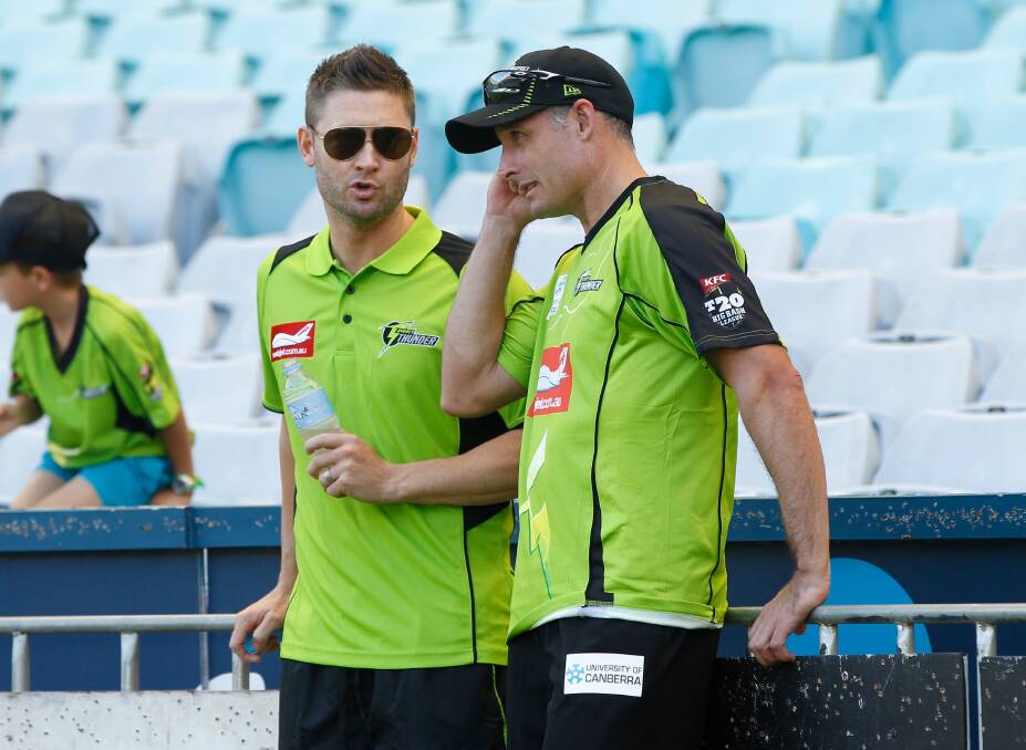 Michael Clarke and Mike Hussey. Picture: ANTHONY JOHNSON