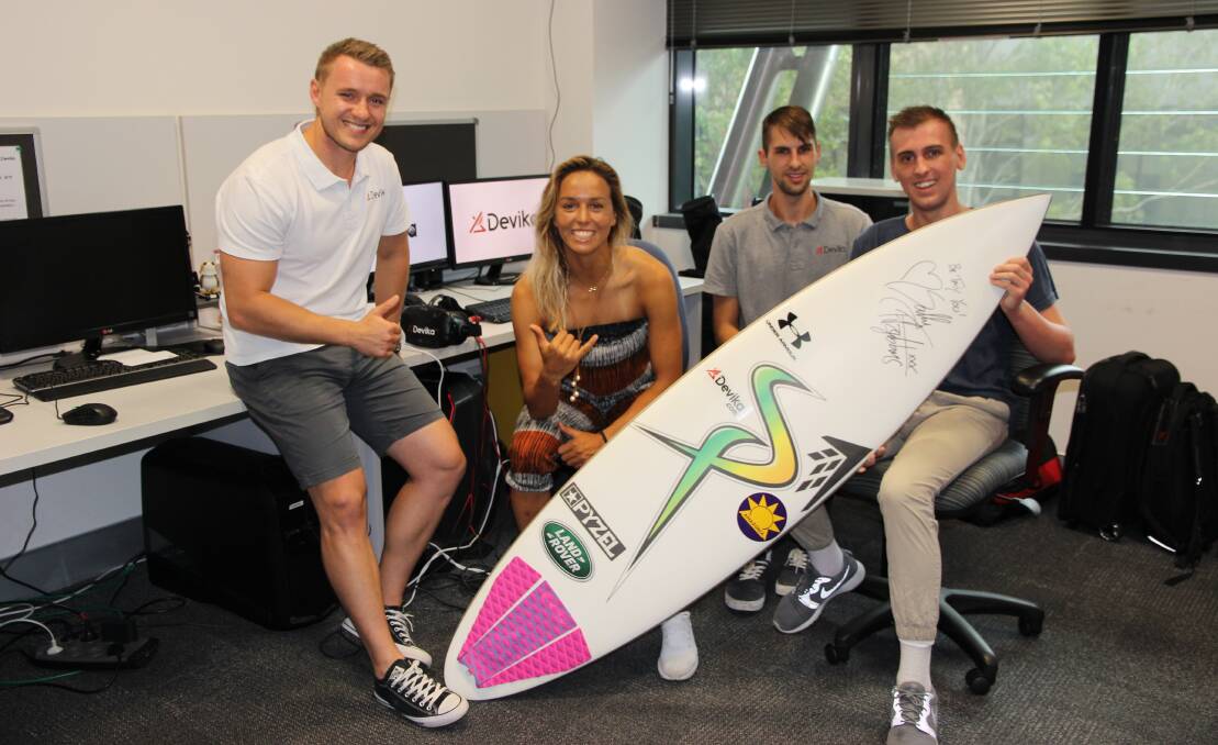 Ken Kencevski and Sally Fitzgibbons with Devika team members 
