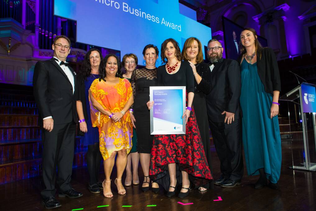 Recognition: Wollongong's Natalie Chapman and her team accepting the micro-business award win at the NSW Telstra Business Awards in 2017.
