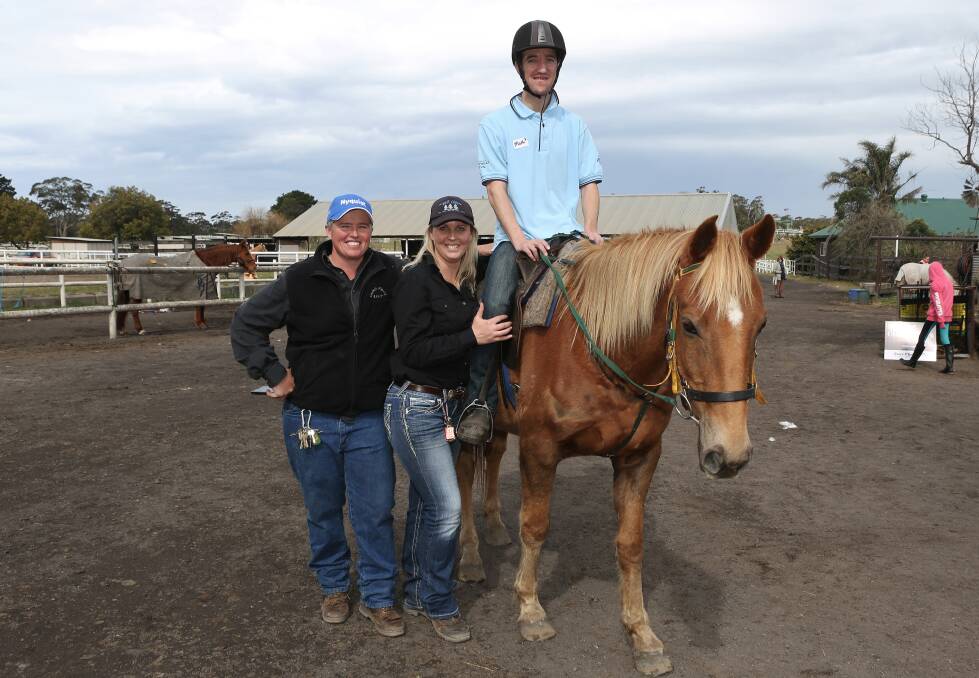 Riding experience: Jules Read, Keiron Tattler and Mark Collett on Keggs at Darkes Forest Ranch's ‘Star Club’ day on Sunday. Picture: Greg Ellis.


