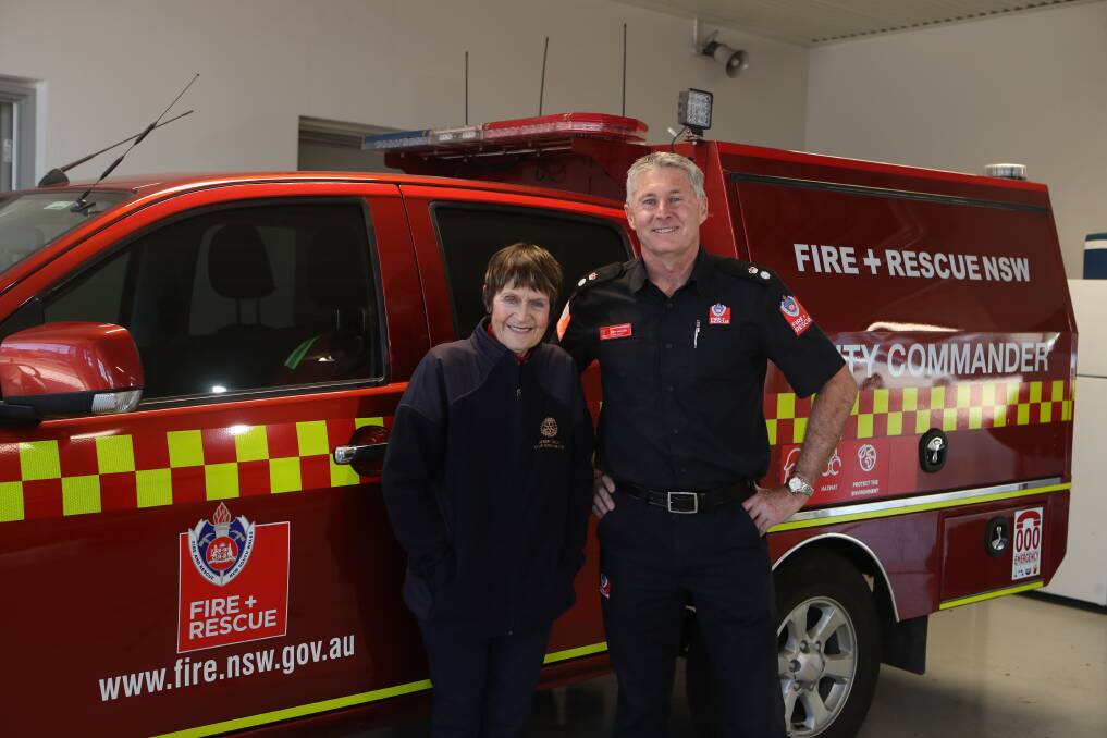 Office of the Year in a Paid Capacity: Rotary Club of Wollongong member and RESCA committee chairperson Dot Hennessy with Superintendent Tony Waller at Wollongong Fire Station. Picture: Sylvia Liber. 