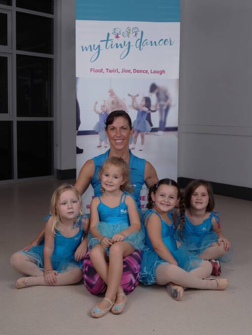 Dancing fun: Stephanie Perrett with young students in one of her many My Tiny Dancers classes in Corrimal, Figtree and Shellharbour. Picture: Greg Ellis.

