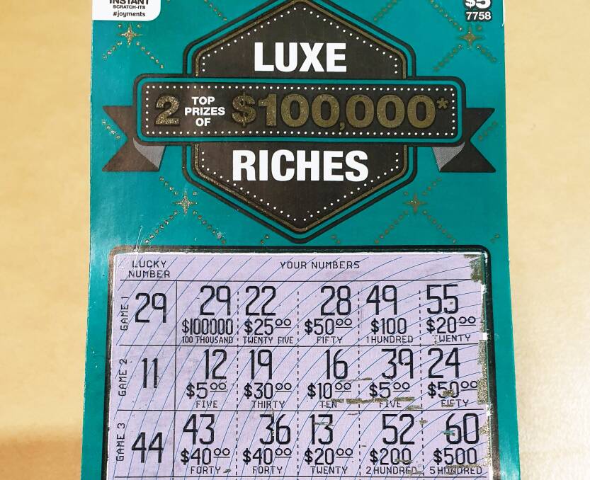 Wollongong man wins $100,000 on a scratchie after premonition