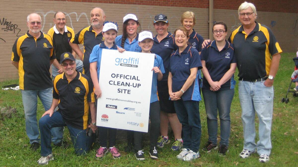 Volunteers: Dapto Girl Guides and Dapto Rotarians get ready for Graffiti Removal Day on October 30.

