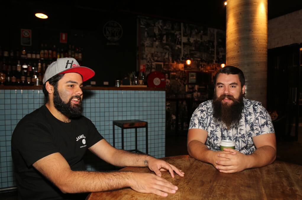Raising the bar on friendship: Ben Abraham and Luke Symons didn't really know each other when they were in the same year at James Sheahan Catholic High in Orange but now they are best mates and business partners at Howlin' Wolf Bar. Picture: Greg Ellis.


