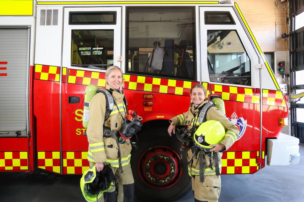 Teamwork: Warrawong firefighters Naomi Cocksedge and Vanessa McKellar. Picture: Adam McLean.
