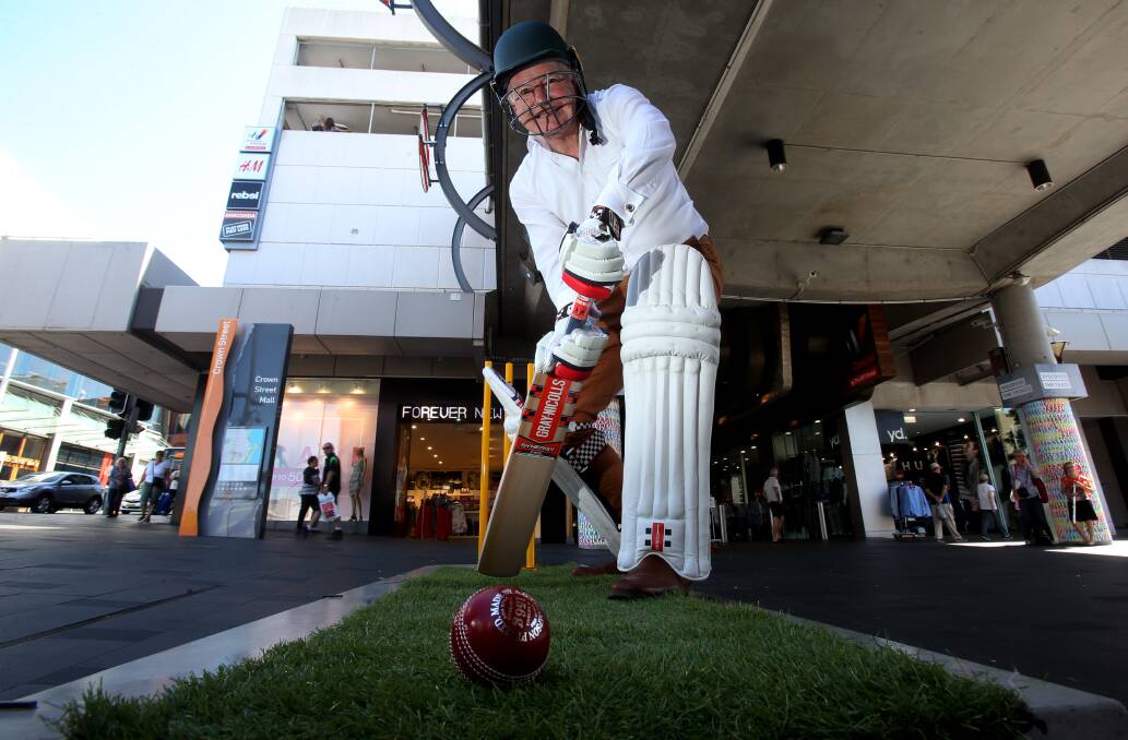 Level playing field: Lord Mayor Gordon Bradbery takes the crease in Crown Street Mall to promote Boxing Day trade and activity in the city centre. Pic: Robert Peet.



