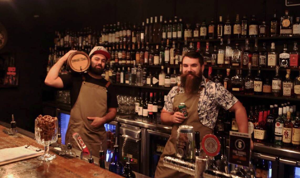 Barpreneurs: Ben Abraham and Luke Symons who, with their friend Scott Mileto, are the owners at Howlin' Wolf Bar and Dagwood and will soon open a third bar specialising in cocktails in Wollongong. Picture: Greg Ellis.
