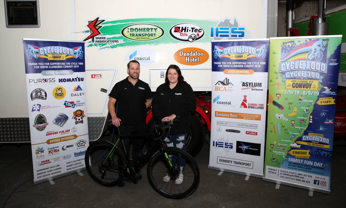 Helping Illawarra families: Daniel Hotchkis and Bianca Starcic at Doherty Transport preparing for the Cycle 1000 seven bike day ride from Ballina to Dapto. Picture: Greg Ellis. 