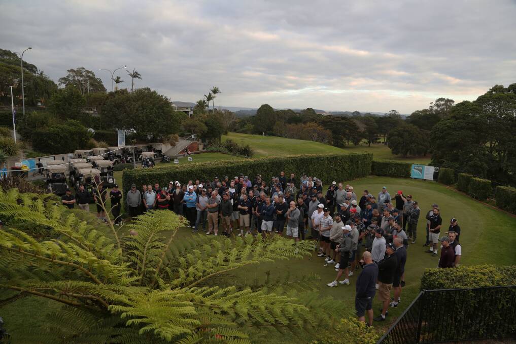 Minutes silence: More than 140 Police officers and supporters of the first Police Legacy Golf Day paused to pay respect to the late Chief Inspector Steven “Johnno” Johnson who died on Tuesday. Pictures: Greg Ellis.

