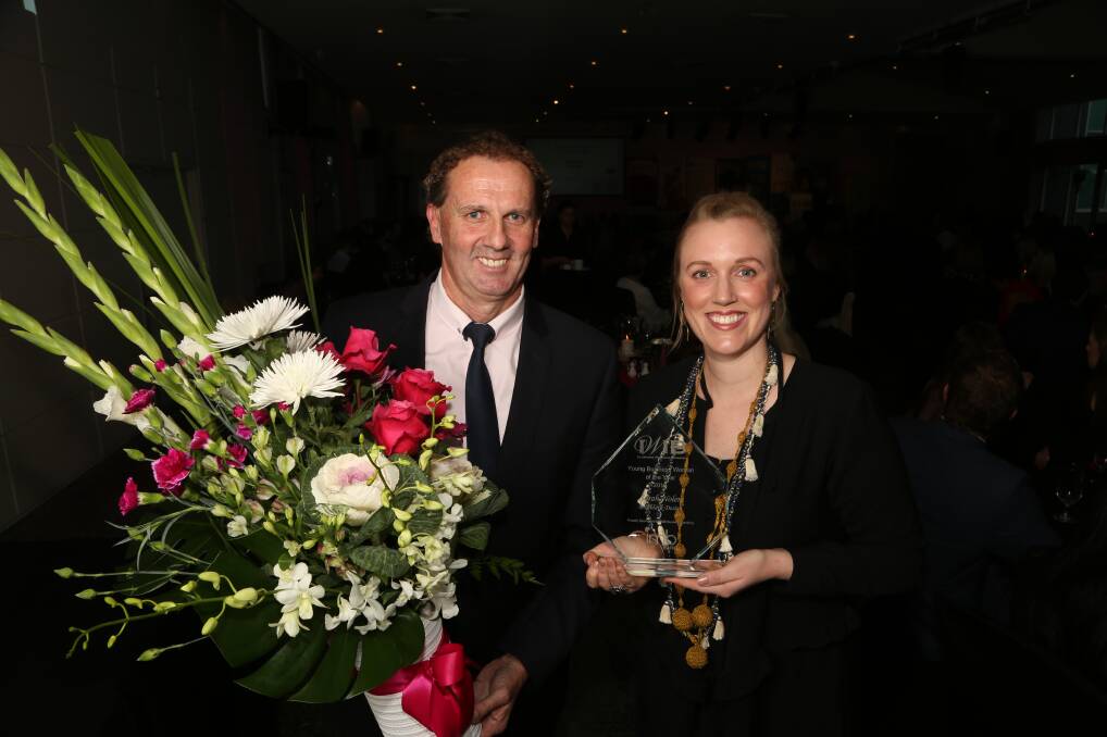 On the rise: IMB Bank's Terry Widdicombe with IWIB Illawarra Young Businesswoman of the Year Sarah Nolen. Picture: Greg Ellis.
