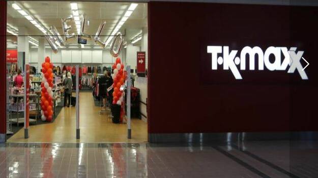 Opening soon: TK Maxx will open its Wollongong Central store on Thursday as work continues putting the finishing touches on the new David Jones above. Picture: Greg Ellis.



