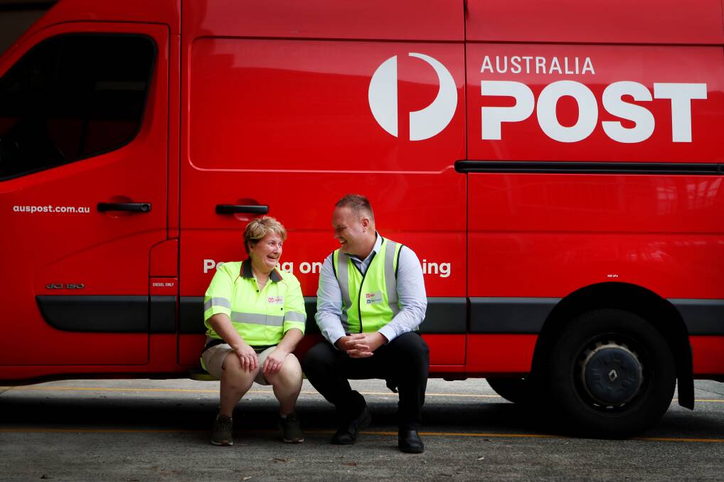 Long service: Helen Cropper with boss Don Kane at Wollongong Delivery Centre. Picture: Sylvia Liber.

