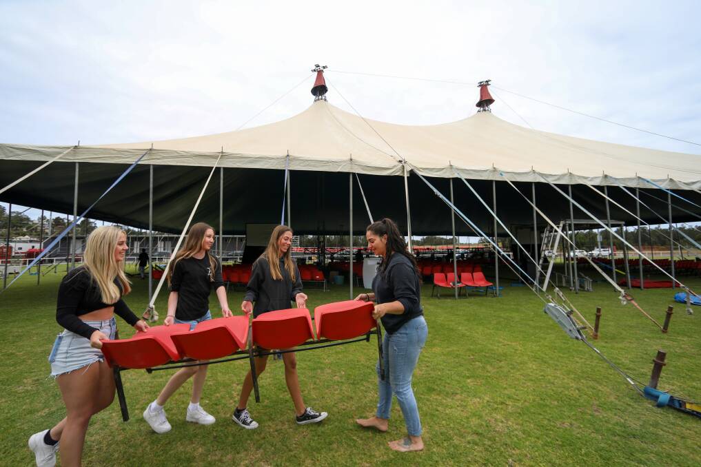 2020 finale: Caitlin Norris, Ella Grossmann, Brooklyn Allen and Allie Davidson setting up seating at the big top tent at Macedonia Park in Berkeley for the Dance Sensations end of year concert. Picture: Adam McLean.