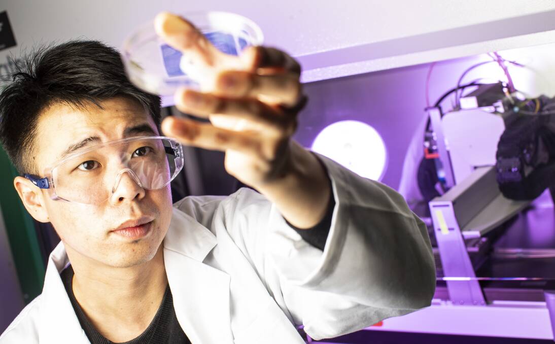 Groundbreaking work: Johnson Chung with a 3D printed ear at the Intelligent Polymer Research Institute at the University of Wollongong Innovation Campus. 