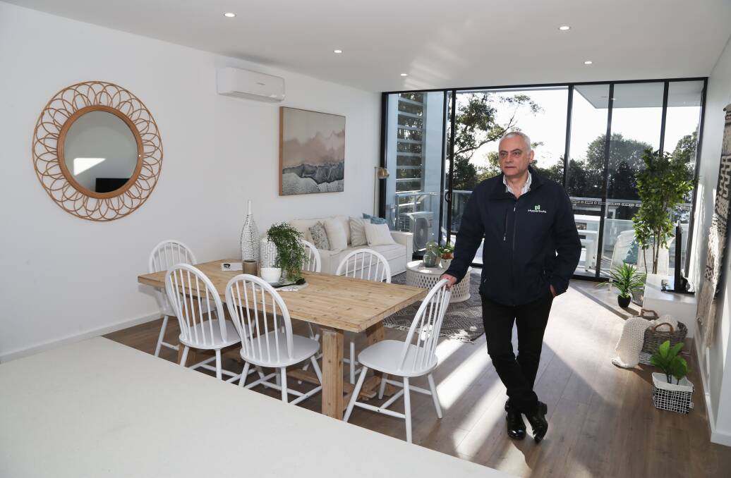 Construction pioneer: Hyperbuild managing director Theo Pasialis is impressed with the final result of the Watermark Shellharbour apartments built with Cross Laminated Timber (CLT). Picture: Greg Ellis.


