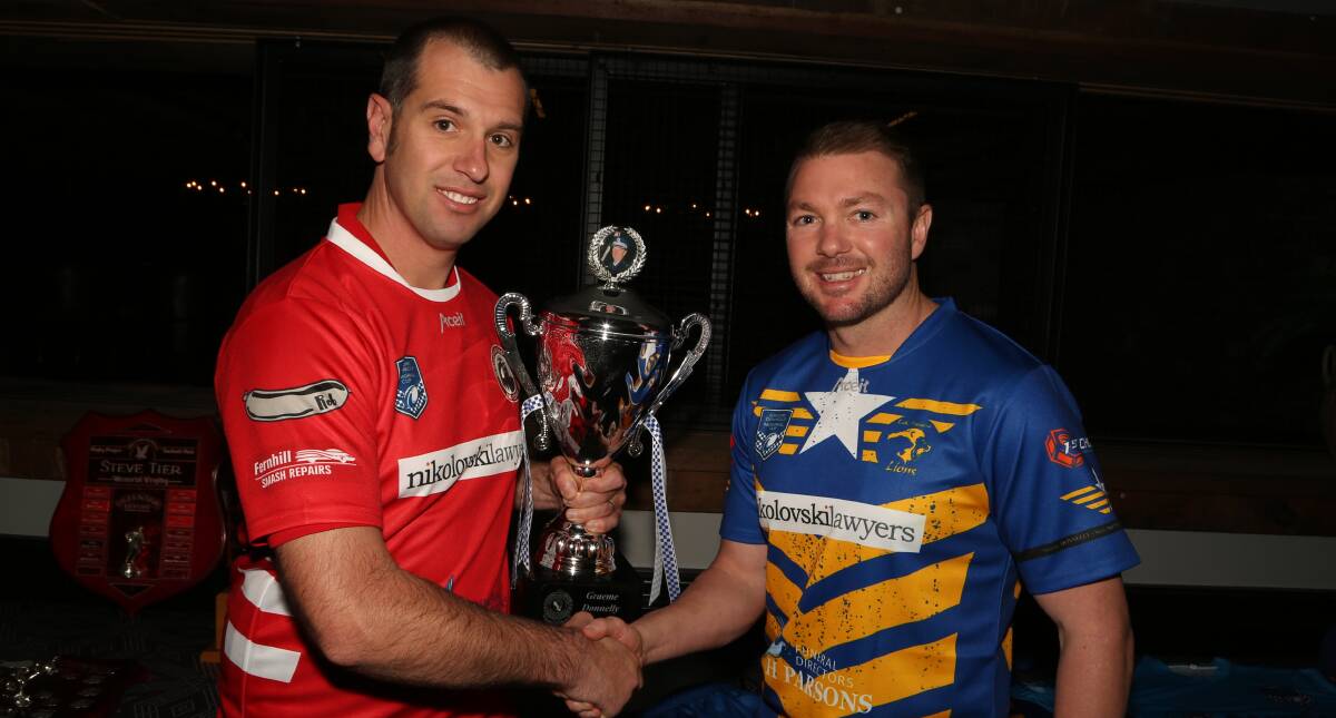 Team captions: Wollongong Area Command Falcons rugby league team captain Dan O'Leary with Lake Illawarra Area Command Lions rugby league team captain Andrew Atkins. Picture: Greg Ellis.
