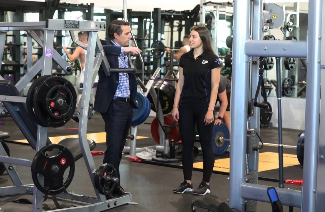 Time to lift restrictions on gyms: Member for Keira Ryan Park talks to club manager Tinnielle Loxley about the challenges of staying open 24/7 with current COVID-19 restrictions. Picture: Robert Peet