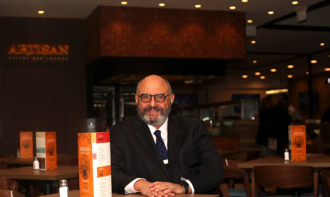 Welcome: Aster Group chief executive Daniel Munk in the new Artisan bar, dining and lounge area which will reopen at Wests Illawarra on Thursday. Picture: Greg Ellis.
