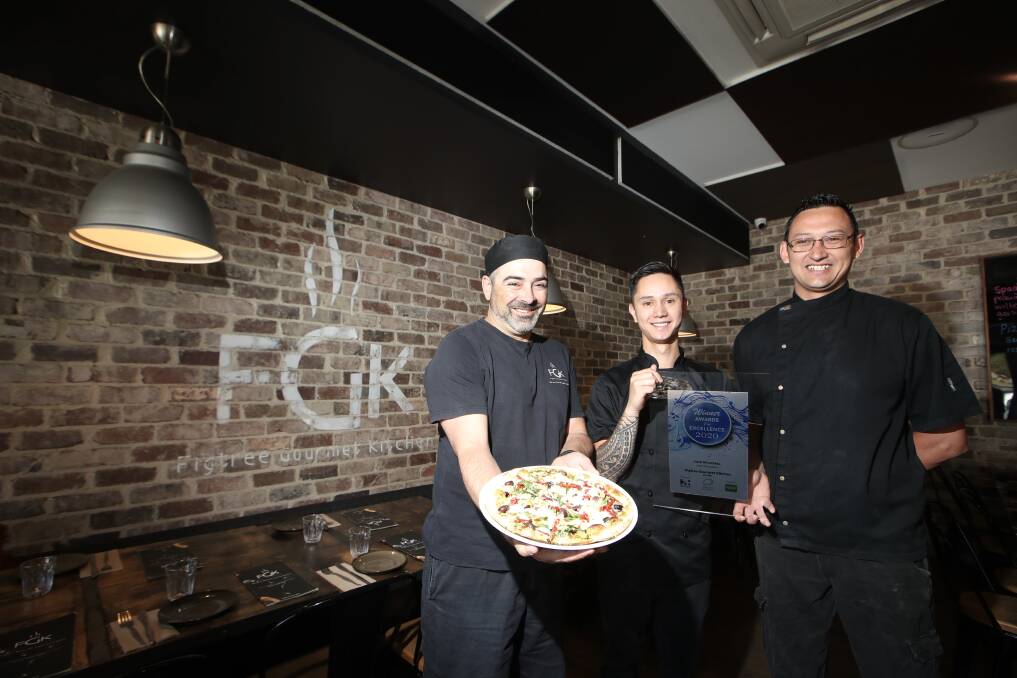 Best in regional NSW: Timothy Rodley, Andrew Ferri and Andy Vannavong at Figtree Gourmet Kitchen with one of their award winning pizzas. Picture: Sylvia Liber.