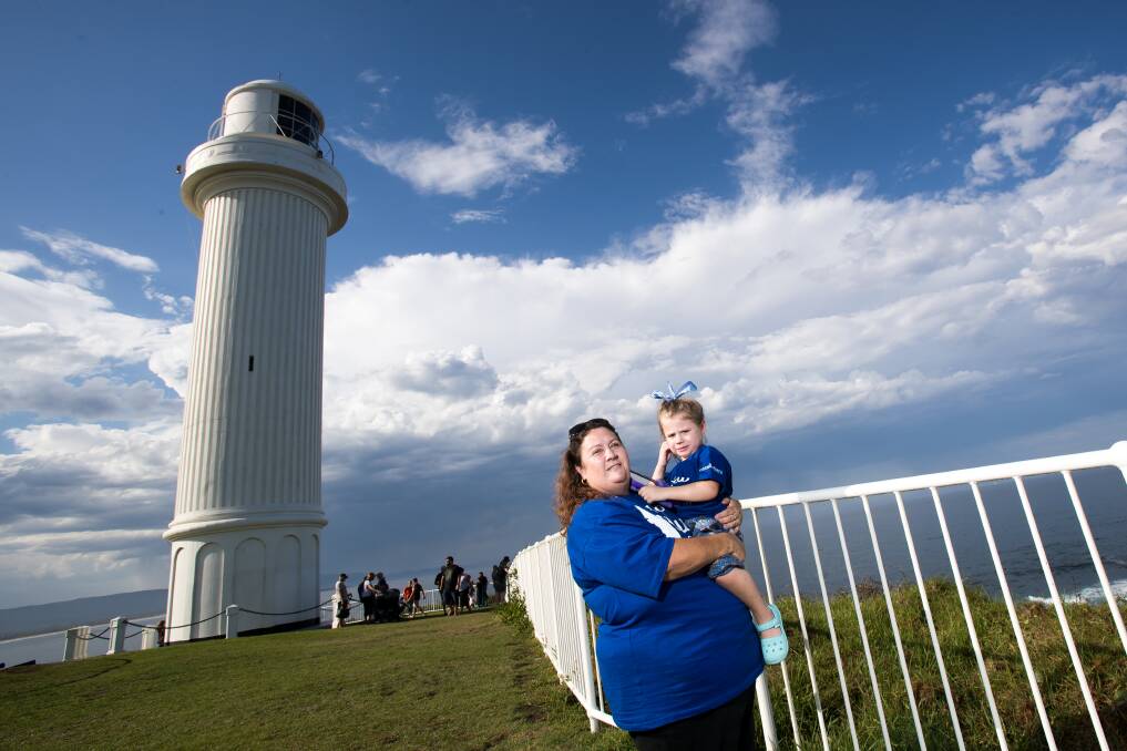 World Austim Day: Event organiser Kylie O'Neill and her daughter Grace. Picture: Adam McLean.
