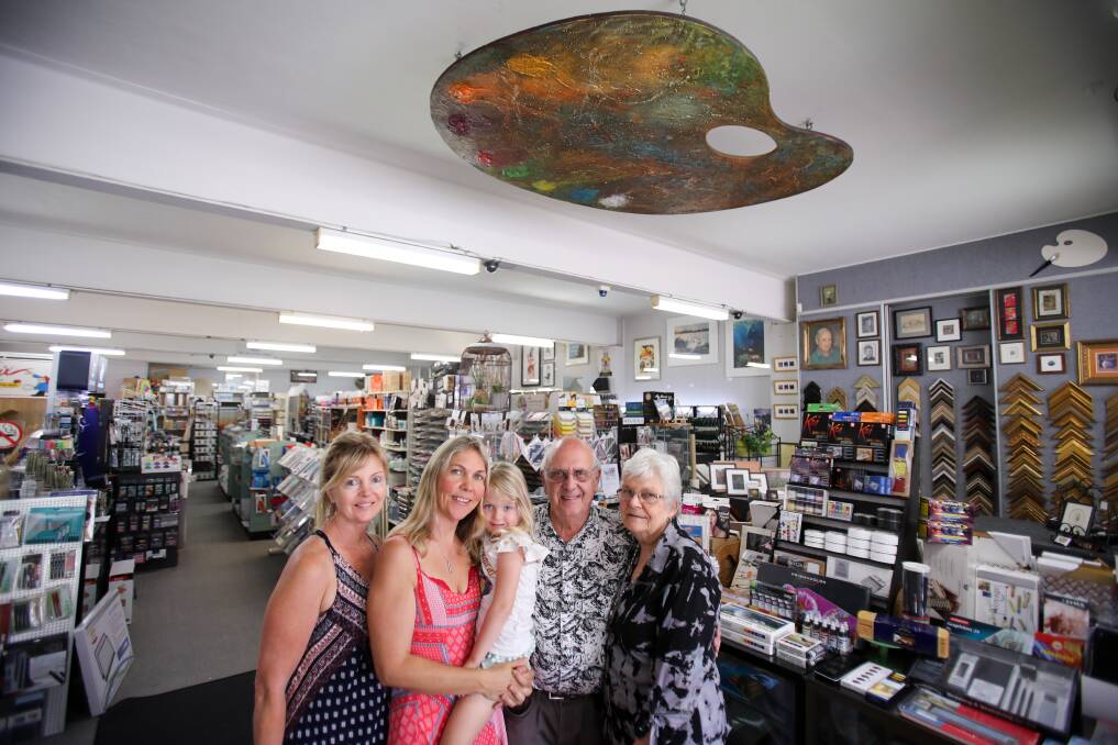 Lever's family: Cheryl Hokin, Renee Clegg, Anneke Clegg, Bill Lever and Ann Lever underneath a giant painting palette made by his father. Picture: Adam McLean.

