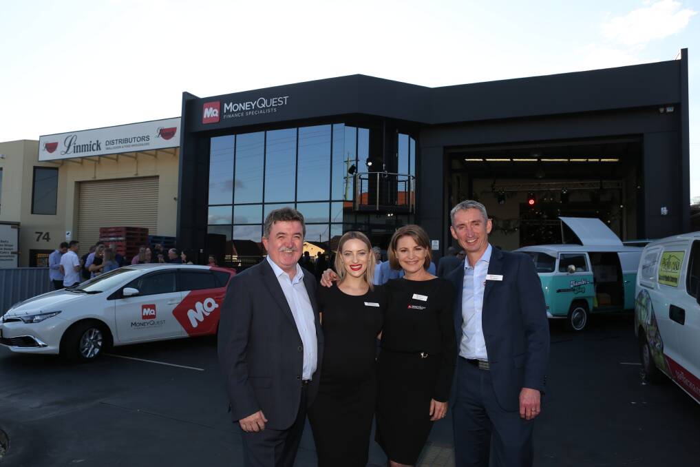 New look business: MoneyQuest Australia managing director Michael Russell with Amy Johnston, Julie Wright and Paul Wright at the new Auburn St office. Pic: Greg Ellis.



