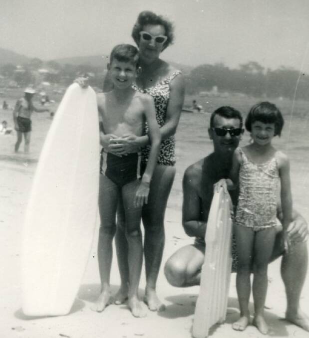 Good times: Michele Adair with as a young girl her family at the beach when her father Keith Richardson was still alive.