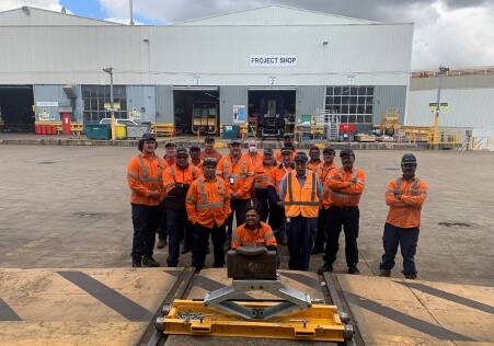 UGL Unipart XPT maintenance crew members with the innovation Wollongong business Prescribe Australia helped come up with to minimise risk in the workplace.
