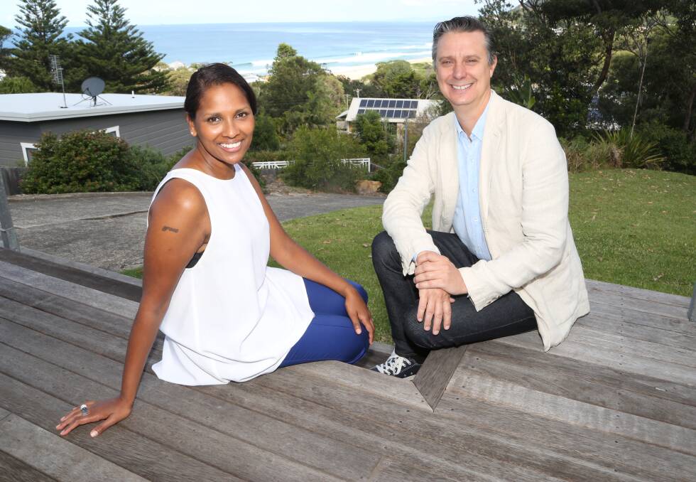 Holiday home demand: Emerald and Aqua's Tanya Demello and Greg Channer with the view from the front deck of a holiday home in Stanwell Park. Pic: Greg Ellis.

