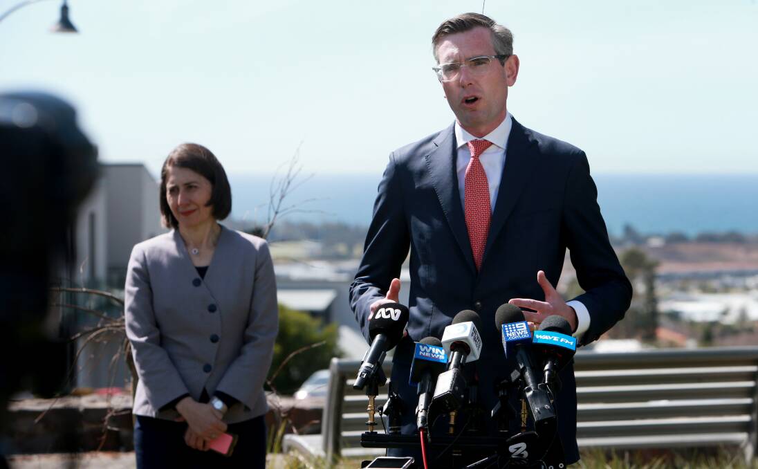 Looking back: Former premier Gladys Berejiklian with then treasurer Dominic Perrottet a year ago announcing a $700 million Shellharbour Hospital construction plan.