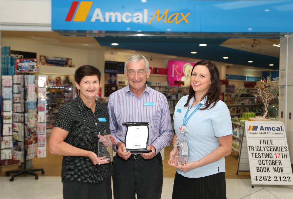 End of an era: Anne McQueen, Peter Abba and Sarah Burton at Amcal Max Dapto. Picture by Greg Ellis.
