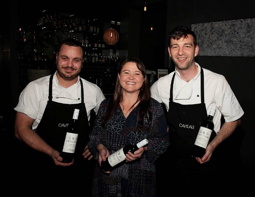 Wine time: Simon Evans, Sarah Crowe and Thomas Chiumento at Caveau Restaurant's Yarra Yering wine dinner on Friday. Picture: Greg Ellis.
