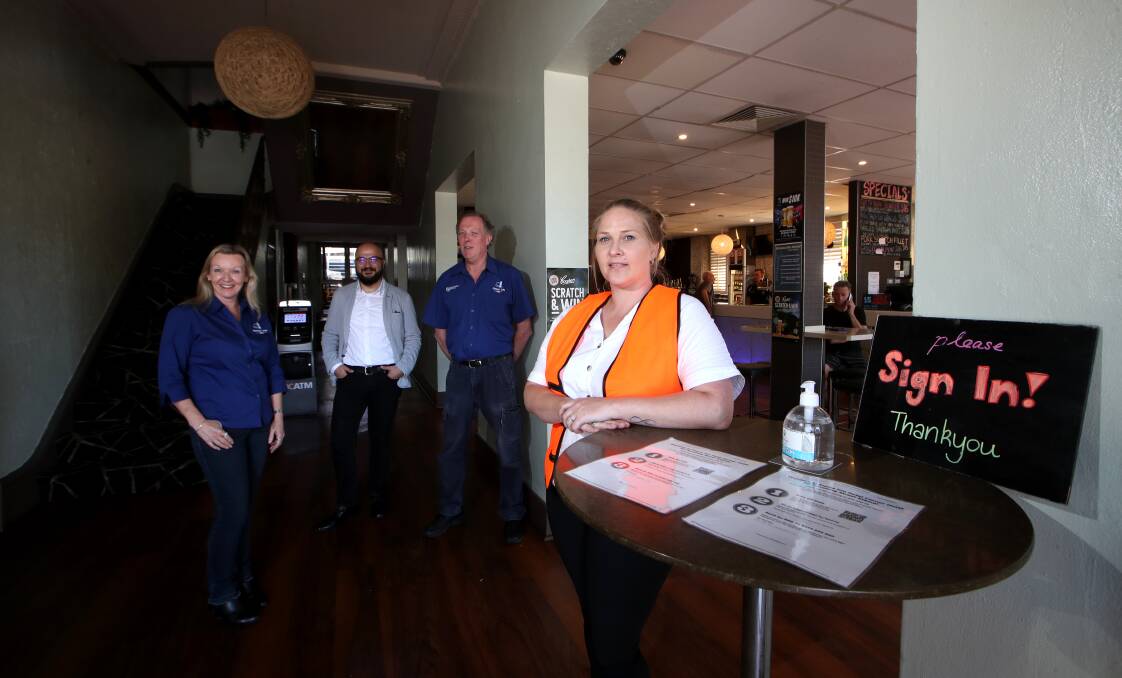 COVID job opportunity: Kiama Inn Hotel's newly appointed COVID marshal Nadine Bornemann with Maggie White, Moe Anaz and Lionel Boekenstein. Picture: Sylvia Liber.
