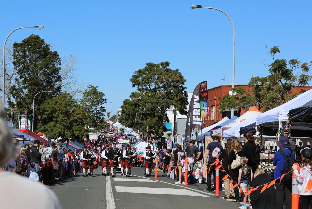 Family friendly festival: Thousands lined the street for the Grand Street Parade on the Princes Hwy Corrimal in 2018. Picture: Greg Ellis.
