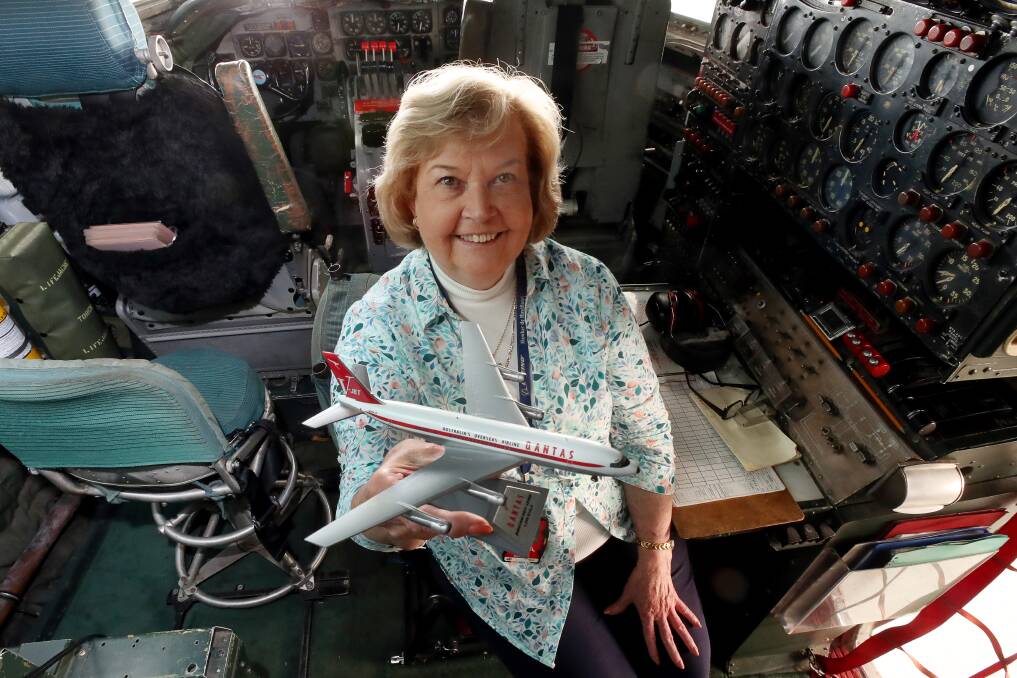 Exciting times: Maureen Massey in the cockpit of the Connie which she says is similar to that of John Travolta's 707. Picture: Robert Peet.
