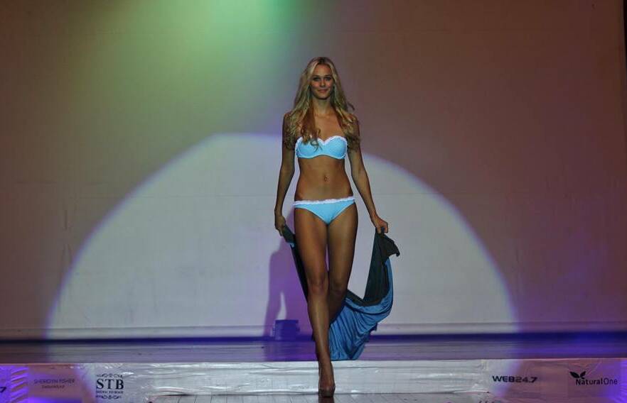 Model citizen: Elevate model agency founder Aleisha Brooke-Smith on the catwalk in Cronulla where she was named Miss Sydney Australia in 2013. Picture: Greg Ellis.
