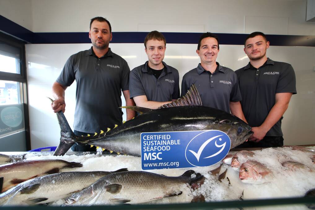 Sustainable oceans: Scott English, Calum Howlett, Grant Logue and Jye Welland with a certified sustainable tuna just in from Queensland. Picture: Sylvia Liber.