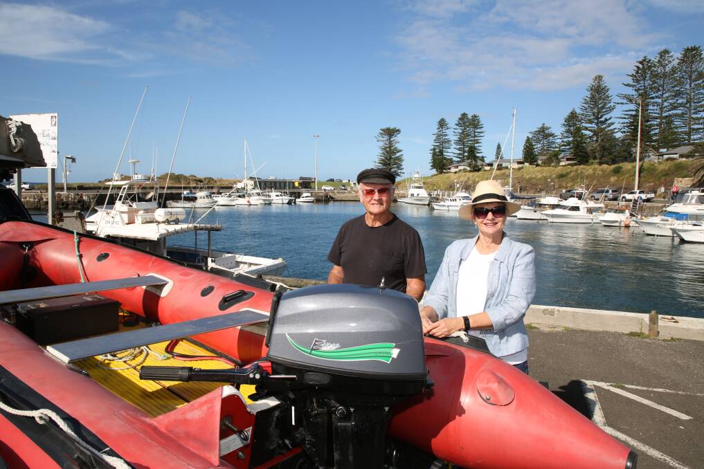 Eco-friendly boating: Ron Kelly and Lynelle Johnson with one of the electric outboards being made in Kiama by Mr Kelly for new business E Class Outboards. Picture: Greg Ellis.
