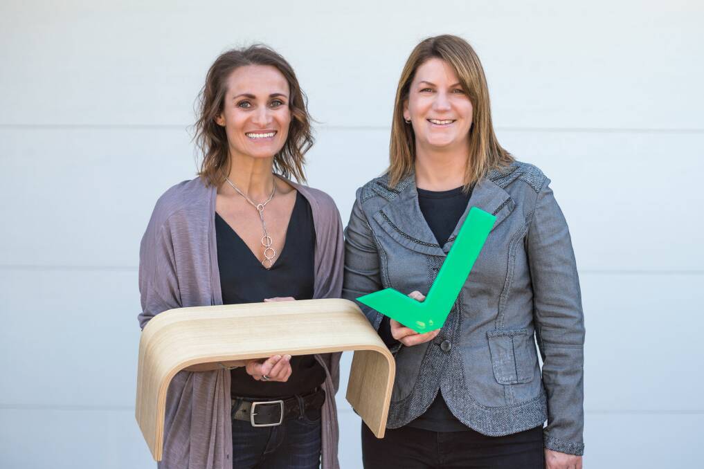 Good Design Award winners: Zhenya Gerson and Jacqueline Weiley with the PROPPR footstool that provides the best position for going to the toilet. 