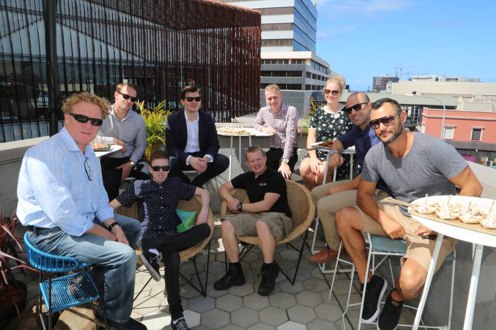 Festival of food and entertainment: Humber owner Adam Murphy (fourth from left) with many of those behind a month long festival called Humberfest which started in the Wollongong CBD on April 1. Picture: Greg Ellis.