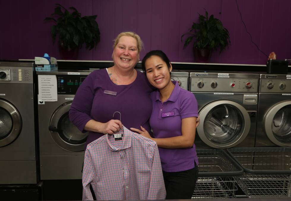 Happy Anniversary: Employee of 30 years Robyn Tolhurst with one of her co-workers Nam Somdpina at City Central Laundry Service. Picture: Greg Ellis.

