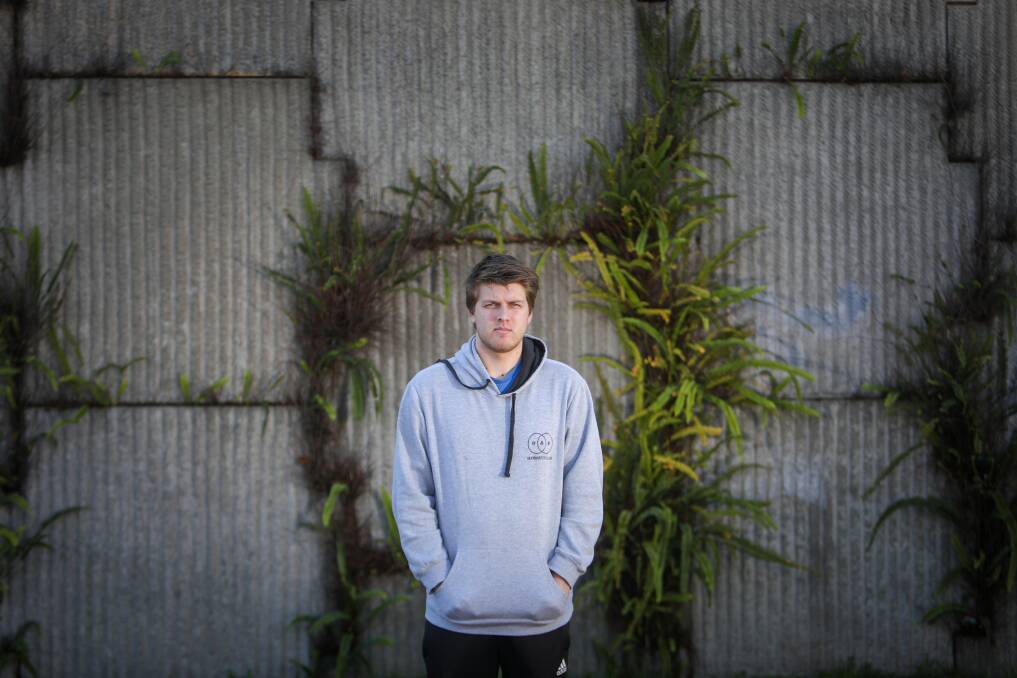 Unfair: Patrick Hutton, a hospitality worker and mechatronics student at UOW, is among many casual workers missing out on the Federal Government's COVID disaster support payment because they receive a youth allowance. Picture: Adam McLean.