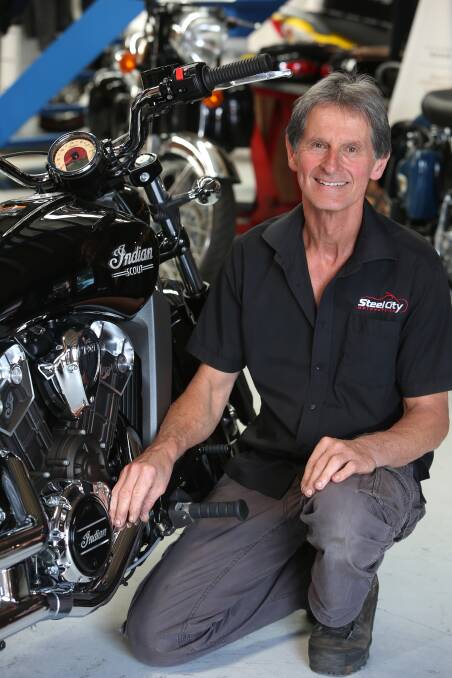Impressed with Indian heritage: Steel City Motorcycles dealer principal Ron Sumskis with one of the new Indian bikes at Fairy Meadow. Pic: Robert Peet.



