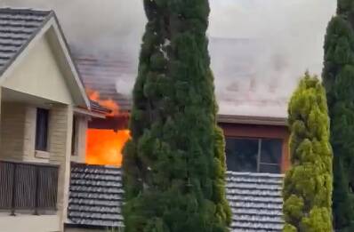 Fire & Rescue NSW rescue man from Port Kembla house fire