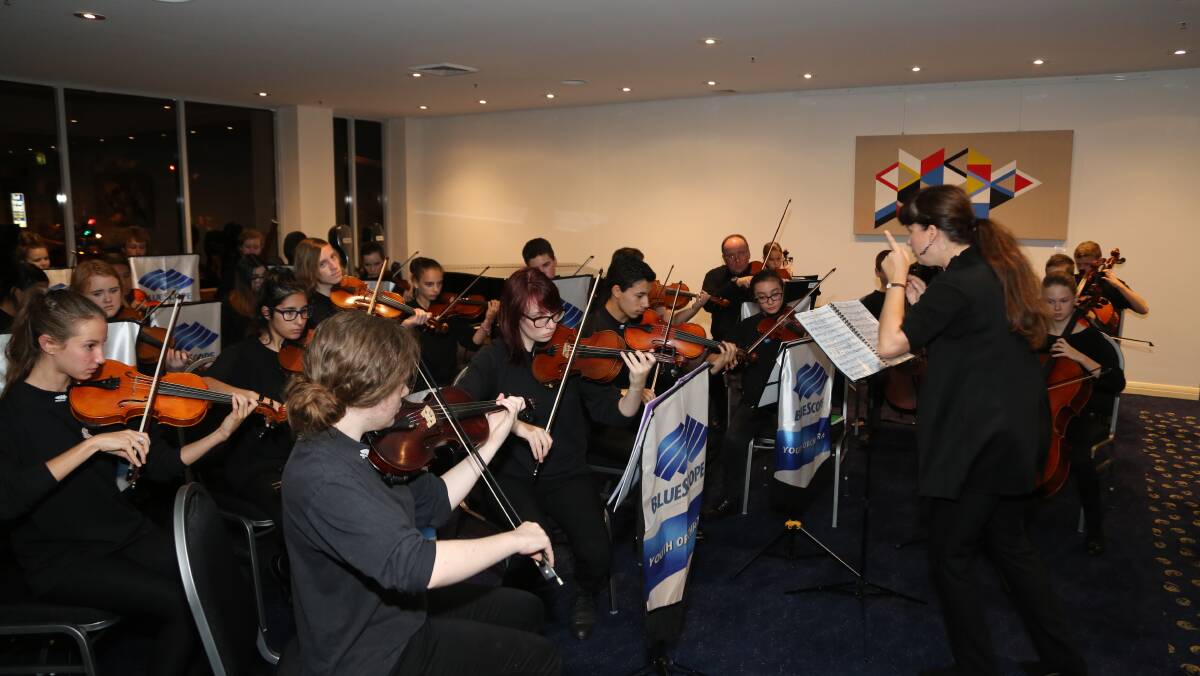Welcome: BlueScope Youth Orchestra plays to welcome guests at The Illawarra Connection. Picture: Greg Ellis.
